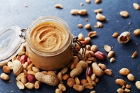 Peanut Butter Mason Jar with Peanuts Surrounding