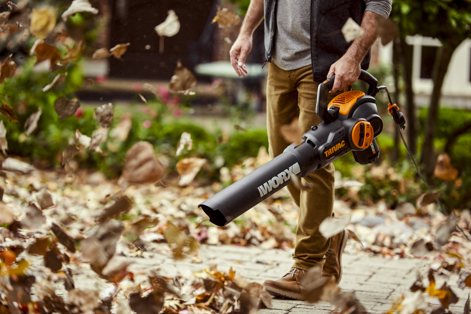 WORX TRIVAC man blowing leaves closeup angle.jpg