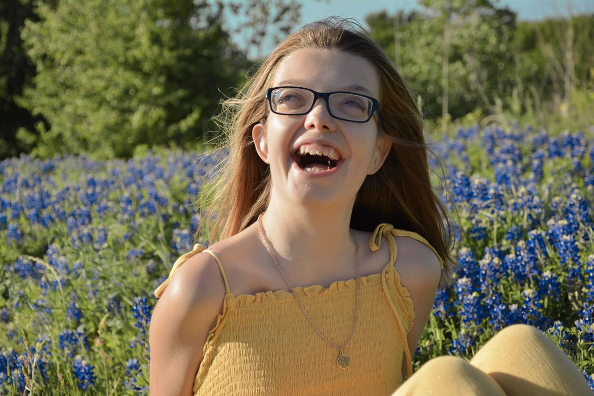 Cassidy Bogner in blue flowers.jpg