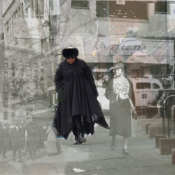 A medium-dark skinned adult woman wearing all black—a fur hat, sunglasses, boots, and a long, voluminous coat—walks on a sidewalk toward the viewer. Black-and-white images of people and urban buildings are layered over the woman.