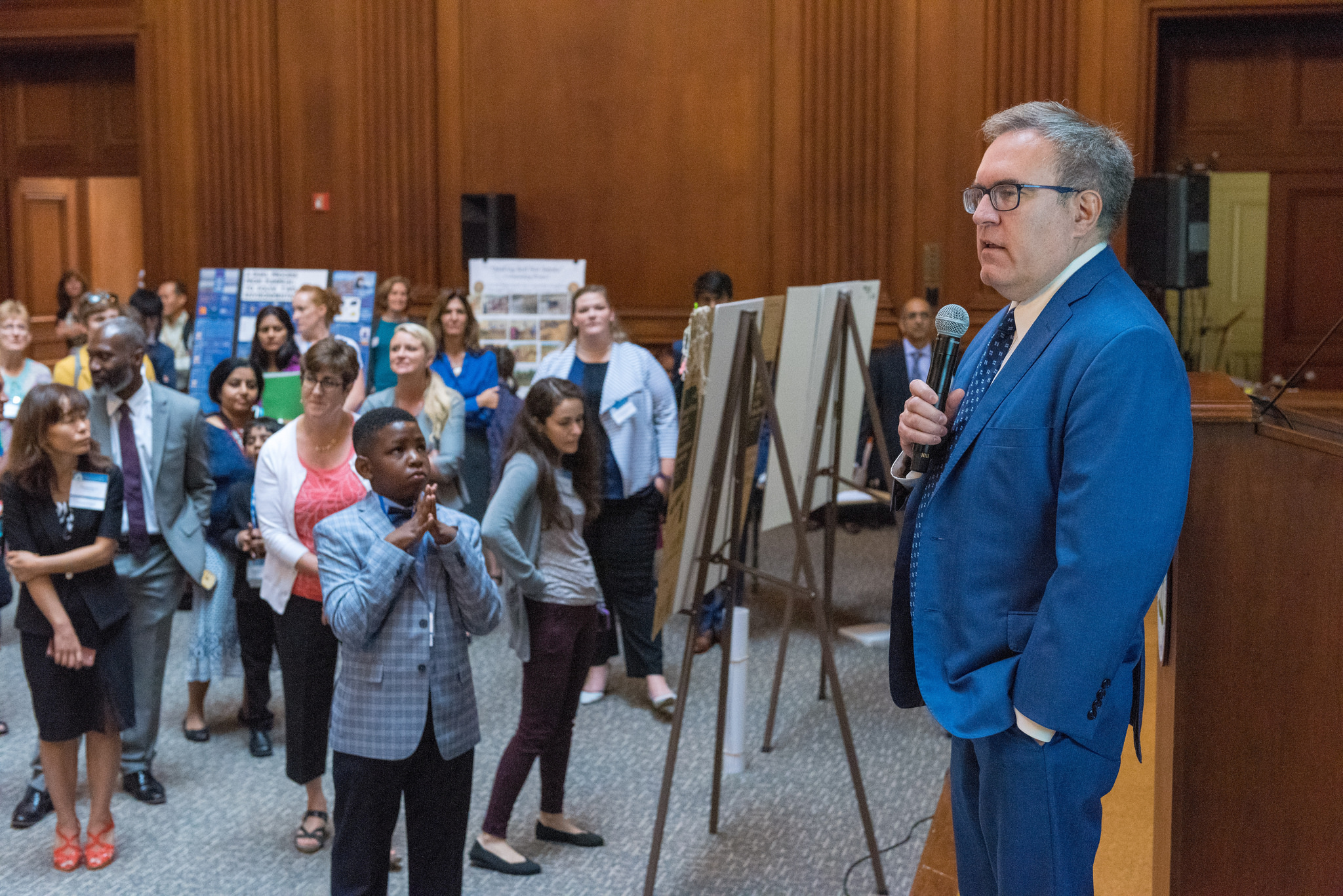 Acting Administrator Andrew Wheeler speaking to students and teachers at a poster session