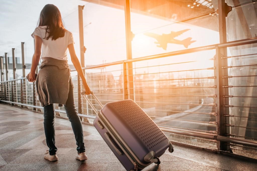 woman with suitcase in airport.jpg